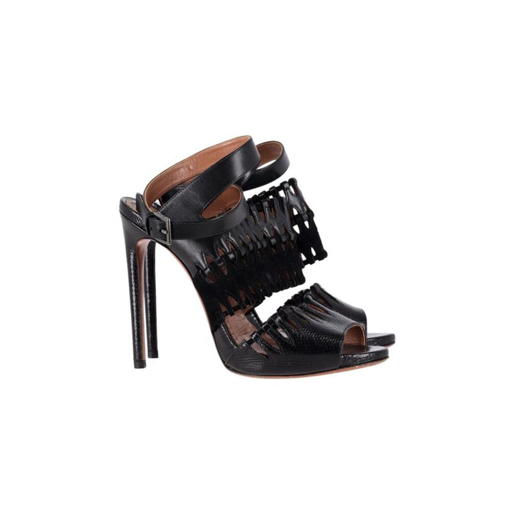 AlaÏa Cut Out Ankle-Strap Sandals in Black Leather